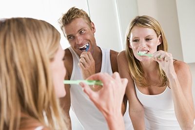 Small Couple Brushing Teeth Bathroom Water Fluoride