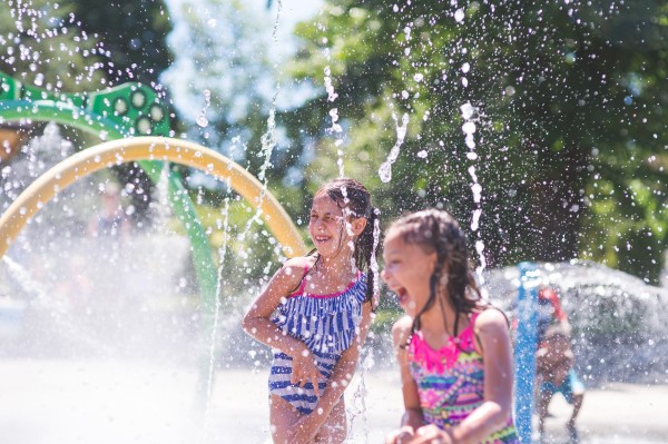 Two Kids Playing in splash pads